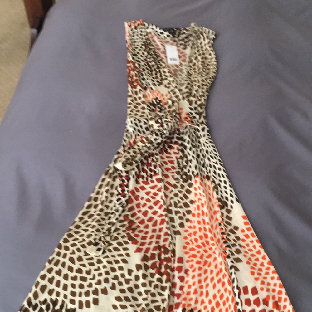 Wrap  dress.  animal patterns in cream